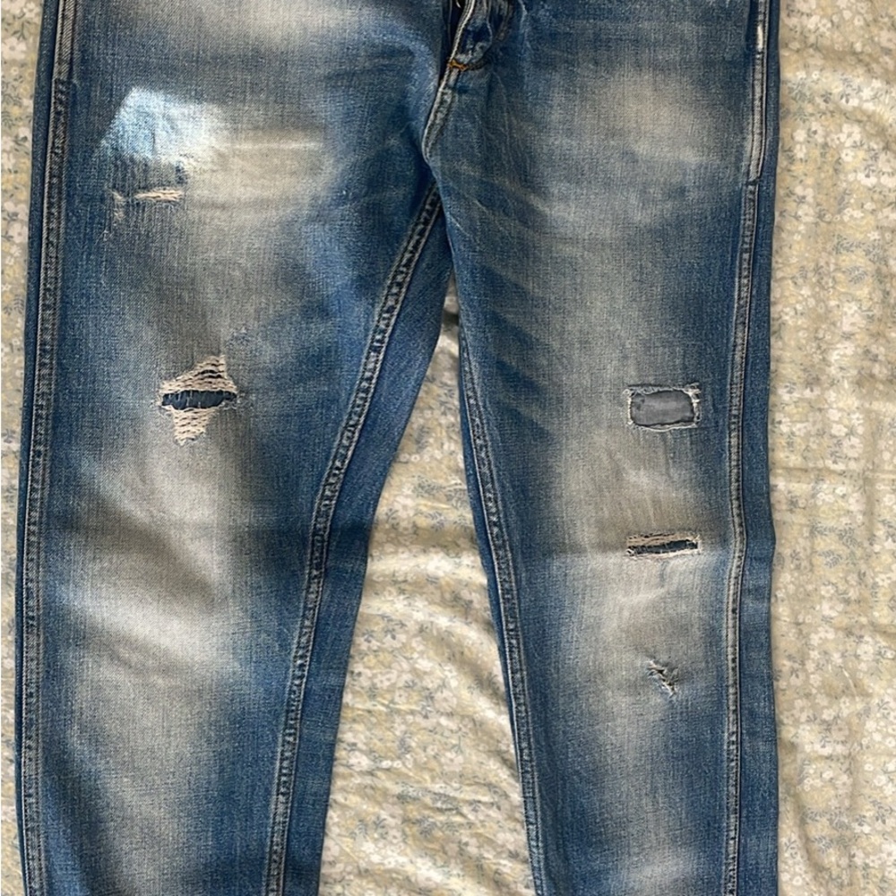 Mens blue buttoned jeans